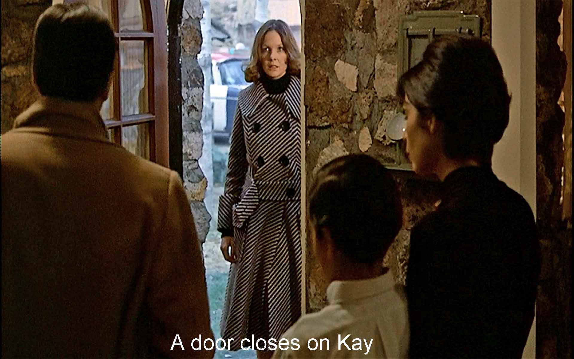 A door closes on Kay
