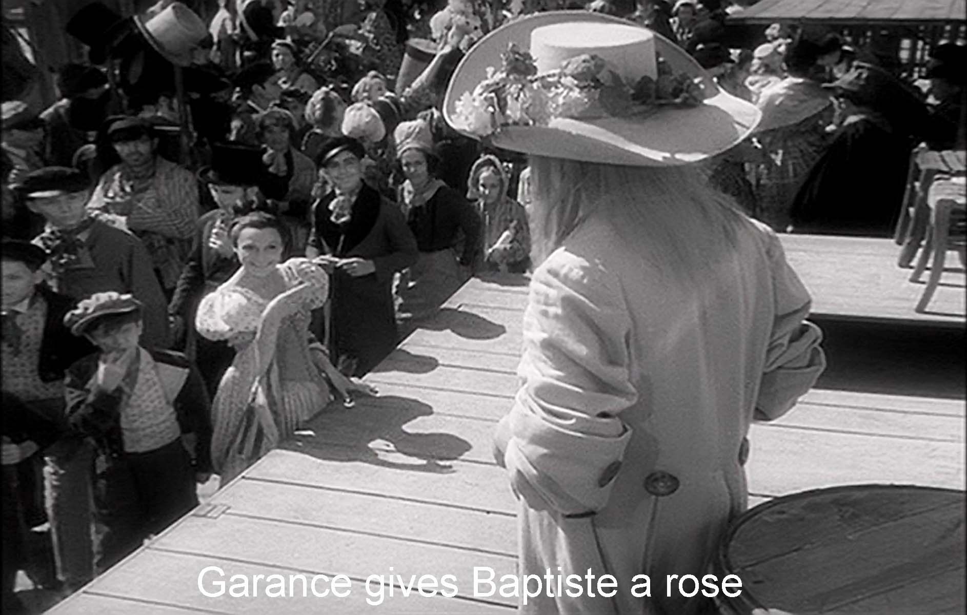 Garance gives Baptiste a rose