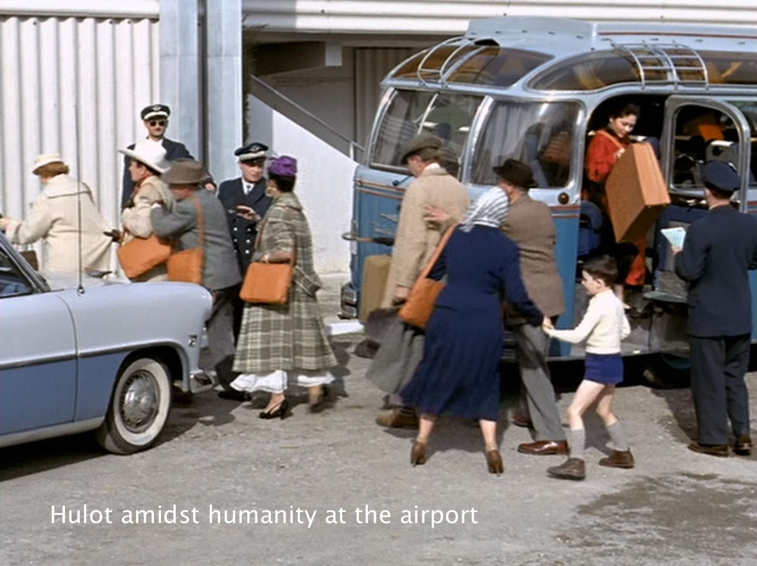 Hulot amidst humanity at the airport